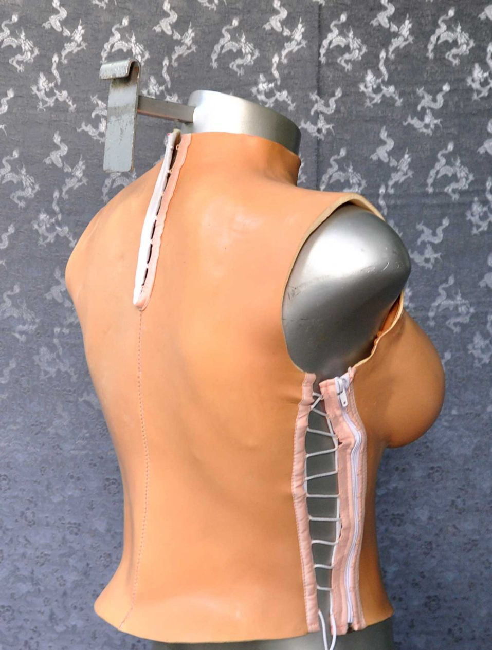 Latex breasts zip